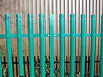 Green powder coated rounded top D profile palisade fence pales